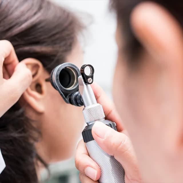Dr. Ruffin examining patient